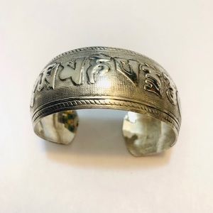 Tibetan Om mantra symbol cuff bracelet